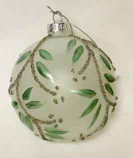 Glass sphere decorated with leaves