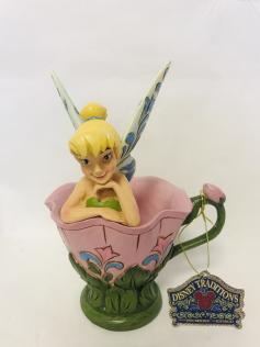 Tinker Bell sitting in a Flower_ Figurine